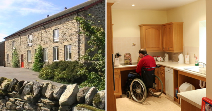 View of Mellwaters Barn Holiday Cottage on a sunny day and a man sat in wheelchair using the kitchen inside a cottage.